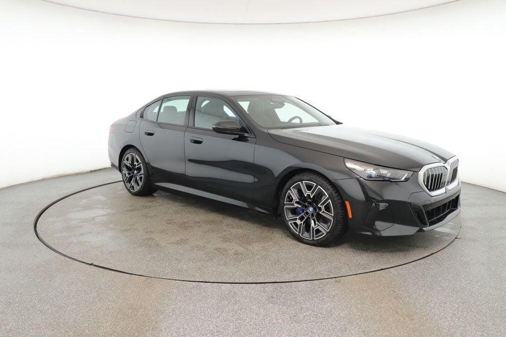 used 2024 BMW i5 car, priced at $53,995