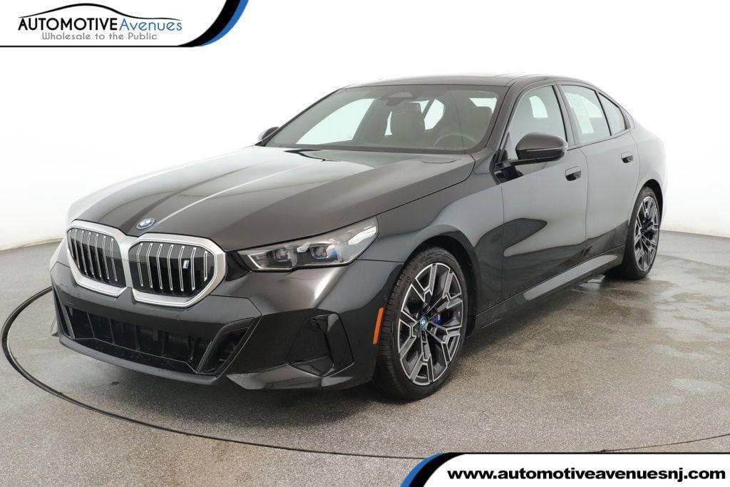 used 2024 BMW i5 car, priced at $53,995
