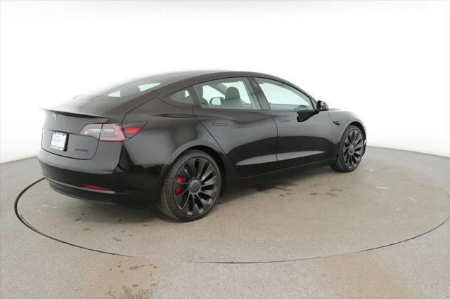 used 2022 Tesla Model 3 car, priced at $27,495