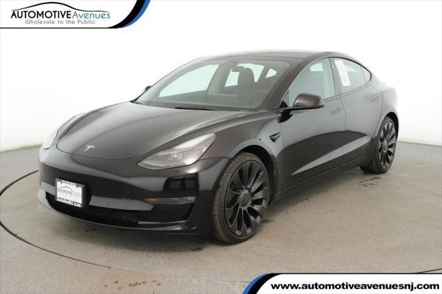 used 2022 Tesla Model 3 car, priced at $27,495