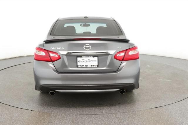 used 2016 Nissan Altima car, priced at $7,995