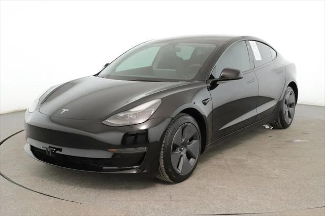 used 2023 Tesla Model 3 car, priced at $22,995