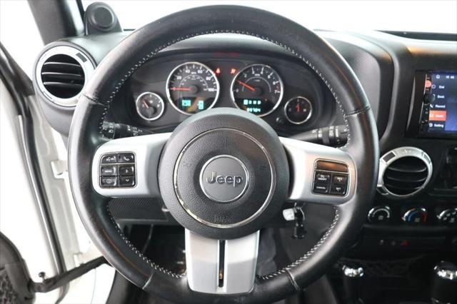 used 2013 Jeep Wrangler Unlimited car, priced at $15,495