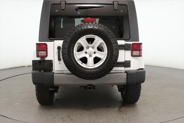 used 2013 Jeep Wrangler Unlimited car, priced at $15,495