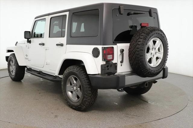 used 2013 Jeep Wrangler Unlimited car, priced at $15,495