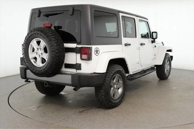 used 2013 Jeep Wrangler Unlimited car, priced at $15,495