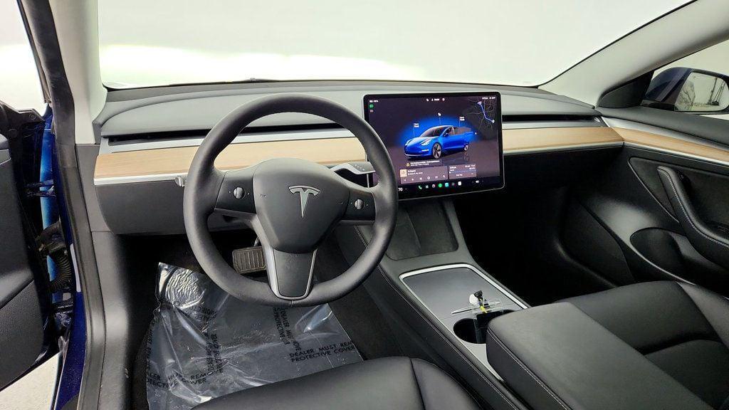 used 2023 Tesla Model 3 car, priced at $23,495