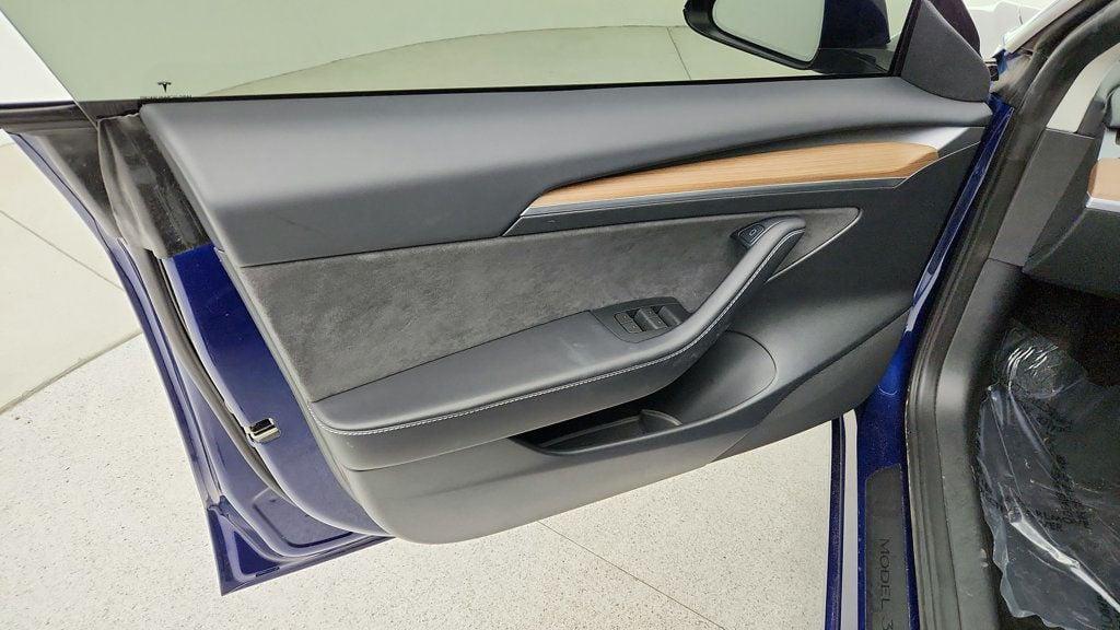 used 2023 Tesla Model 3 car, priced at $23,495