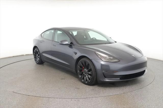 used 2022 Tesla Model 3 car, priced at $28,595