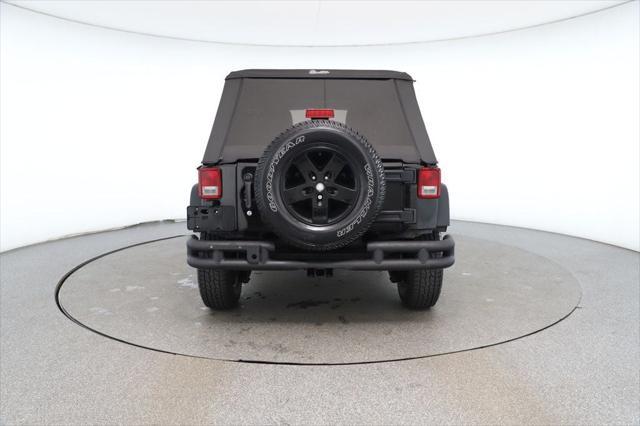 used 2013 Jeep Wrangler Unlimited car, priced at $13,495