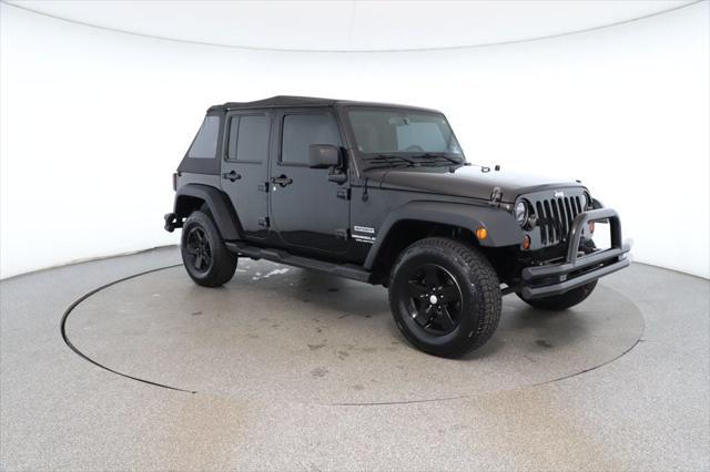 used 2013 Jeep Wrangler Unlimited car, priced at $13,495