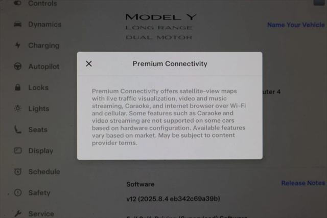 used 2024 Tesla Model Y car, priced at $33,995