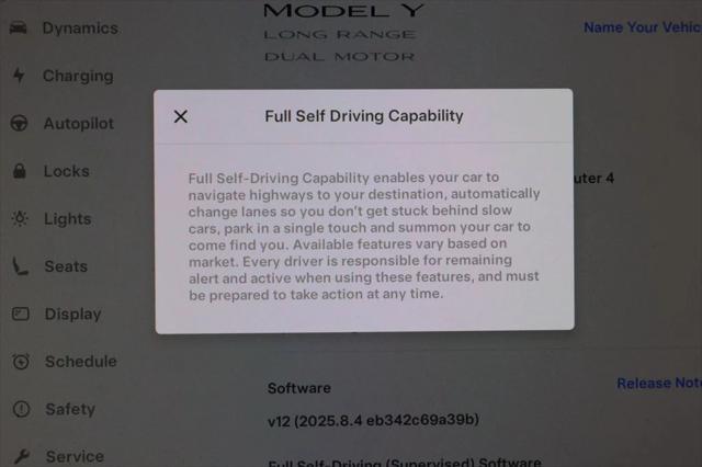 used 2024 Tesla Model Y car, priced at $33,995