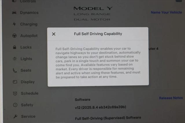 used 2024 Tesla Model Y car, priced at $33,995