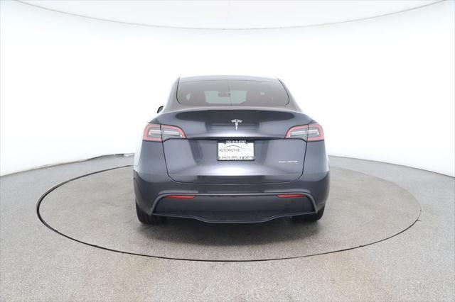 used 2024 Tesla Model Y car, priced at $33,995