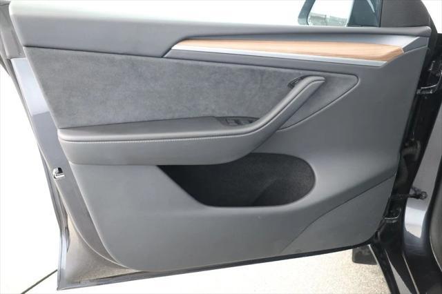 used 2024 Tesla Model Y car, priced at $33,995