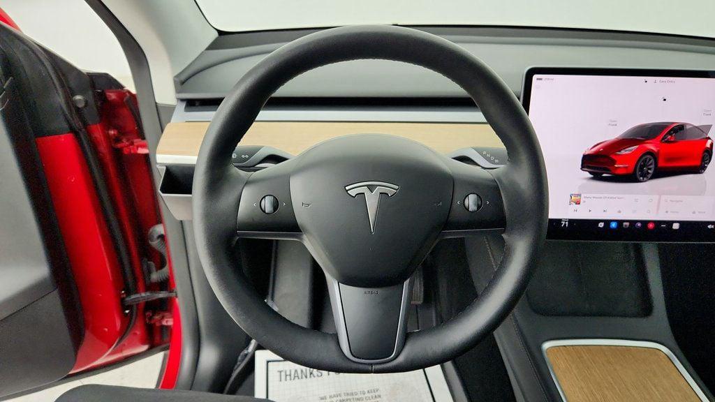used 2023 Tesla Model Y car, priced at $26,495