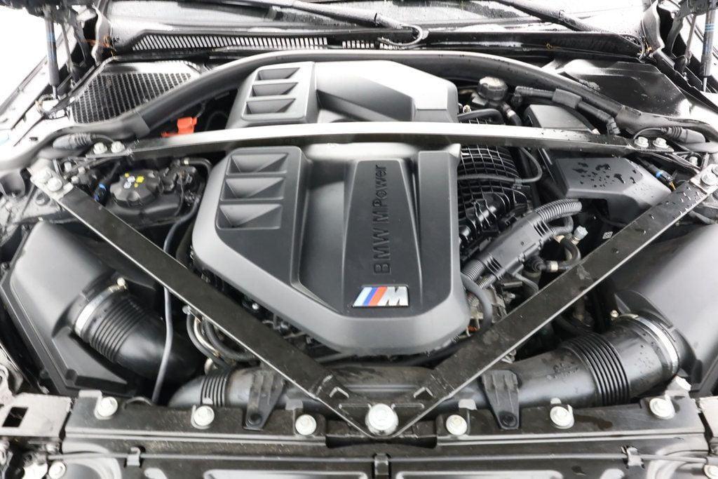 used 2024 BMW M4 car, priced at $68,995