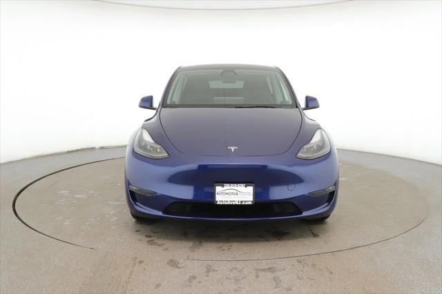 used 2024 Tesla Model Y car, priced at $34,995