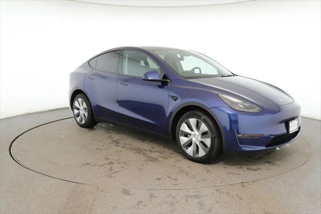 used 2024 Tesla Model Y car, priced at $34,995