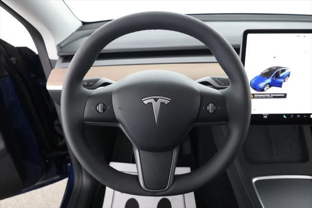 used 2024 Tesla Model Y car, priced at $34,995