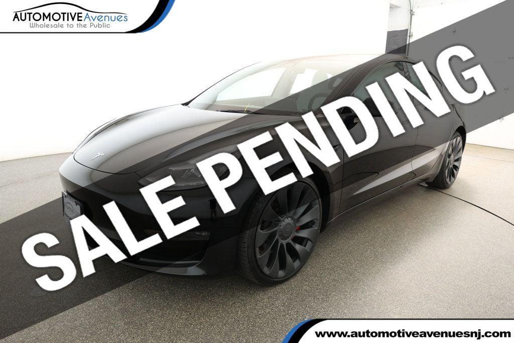 used 2023 Tesla Model 3 car, priced at $29,995