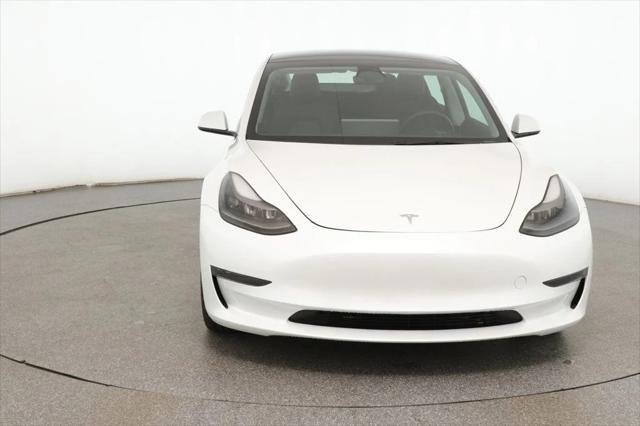 used 2023 Tesla Model 3 car, priced at $24,495