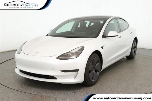 used 2023 Tesla Model 3 car, priced at $24,495