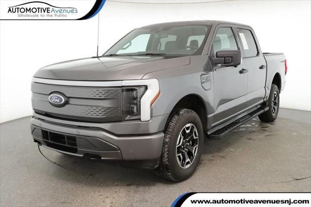 used 2023 Ford F-150 Lightning car, priced at $38,995