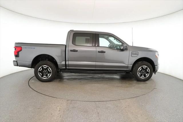 used 2023 Ford F-150 Lightning car, priced at $38,995