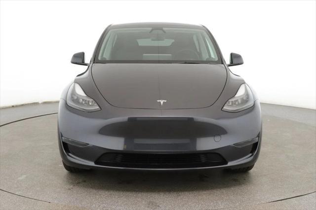 used 2024 Tesla Model Y car, priced at $32,995