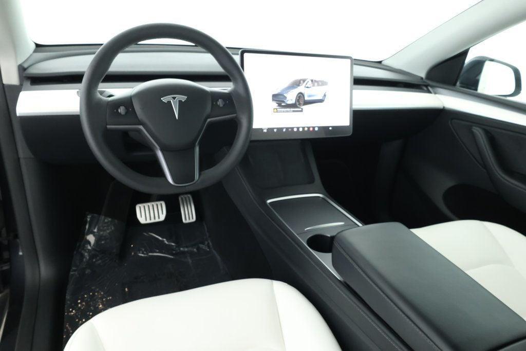 used 2024 Tesla Model Y car, priced at $35,495
