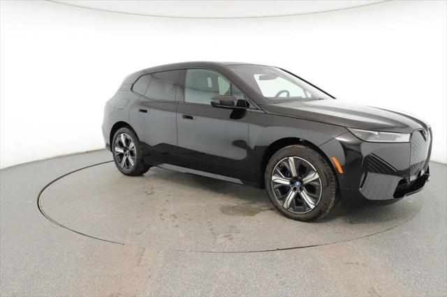 used 2024 BMW iX car, priced at $63,995