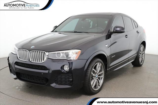 used 2016 BMW X4 car, priced at $20,495