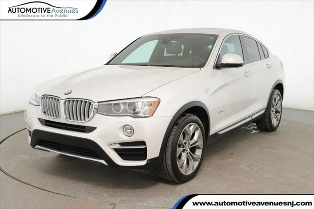 used 2018 BMW X4 car, priced at $27,495