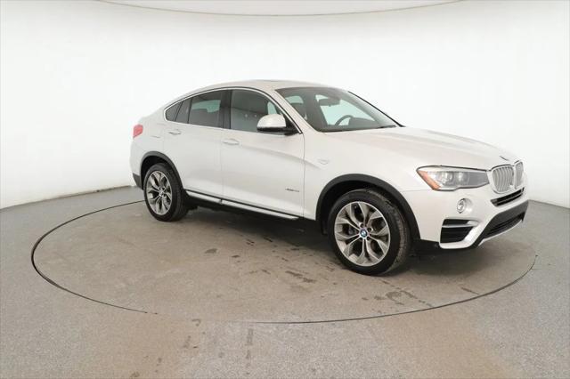 used 2018 BMW X4 car, priced at $27,495