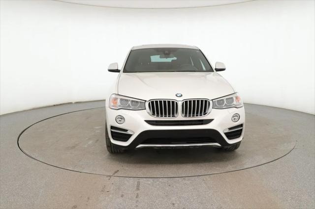 used 2018 BMW X4 car, priced at $27,495