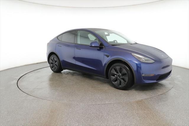 used 2024 Tesla Model Y car, priced at $35,995