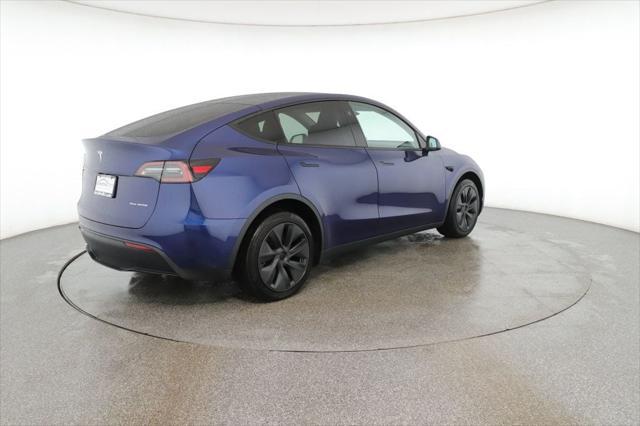 used 2024 Tesla Model Y car, priced at $35,995