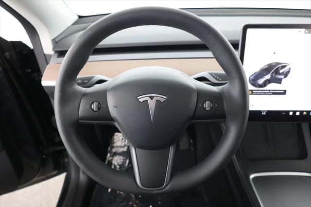 used 2024 Tesla Model Y car, priced at $31,995