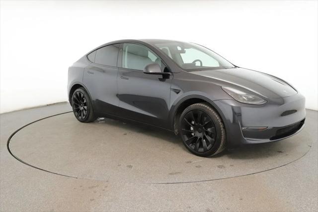 used 2024 Tesla Model Y car, priced at $31,995