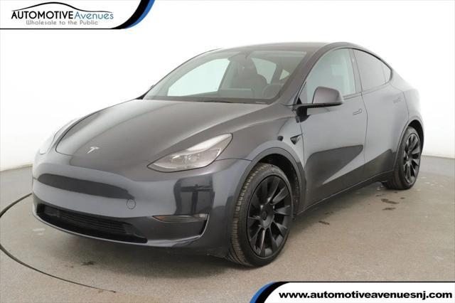 used 2024 Tesla Model Y car, priced at $31,995