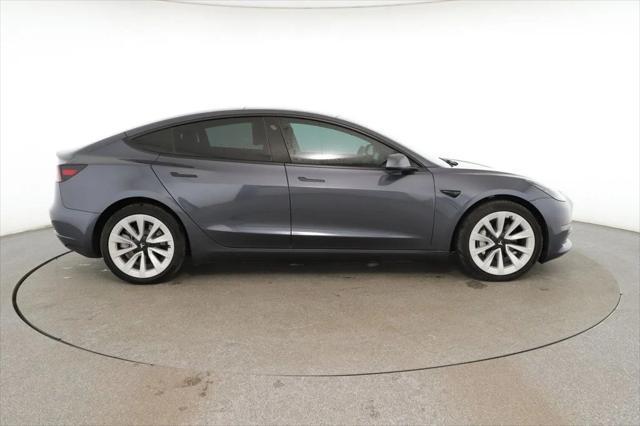 used 2023 Tesla Model 3 car, priced at $27,995