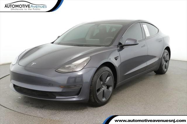 used 2023 Tesla Model 3 car, priced at $23,495