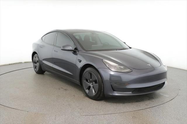 used 2023 Tesla Model 3 car, priced at $23,495