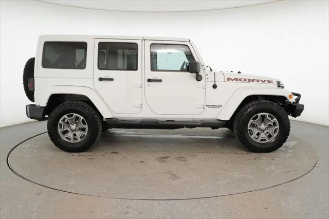 used 2011 Jeep Wrangler Unlimited car, priced at $10,995