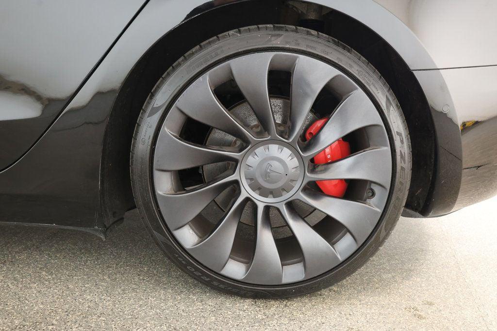 used 2022 Tesla Model 3 car, priced at $28,195