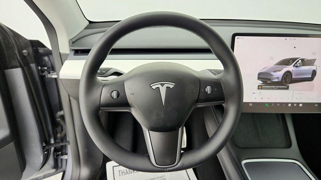 used 2025 Tesla Model Y car, priced at $36,495