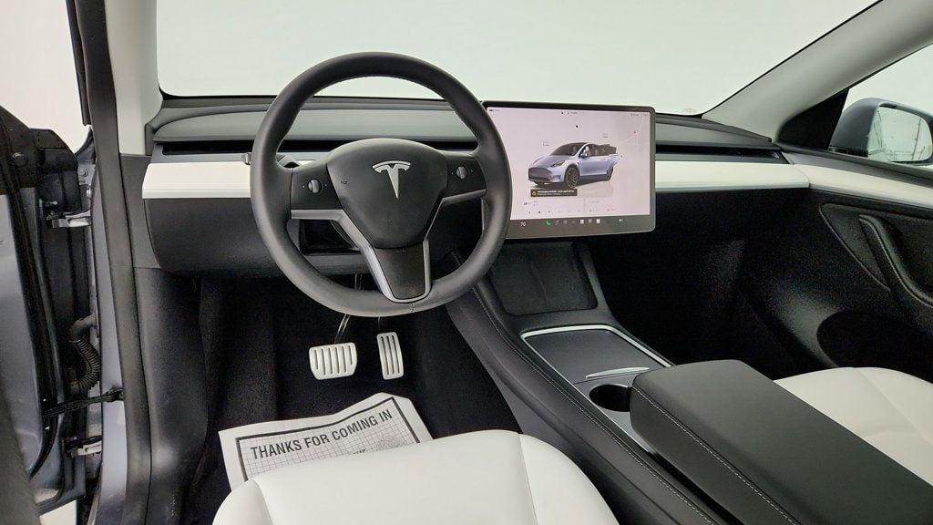 used 2025 Tesla Model Y car, priced at $36,495