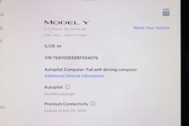 used 2024 Tesla Model Y car, priced at $33,995